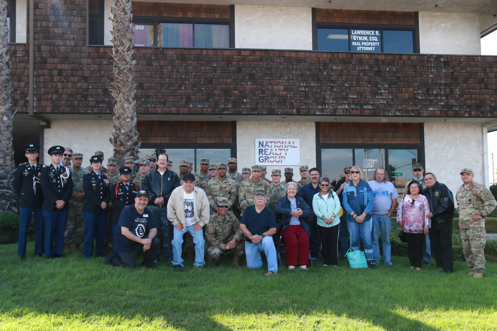 Veterans, active-duty service members and JROTC cadets gathered outside the National Realty Group office on Indiana Avenue in Riverside.